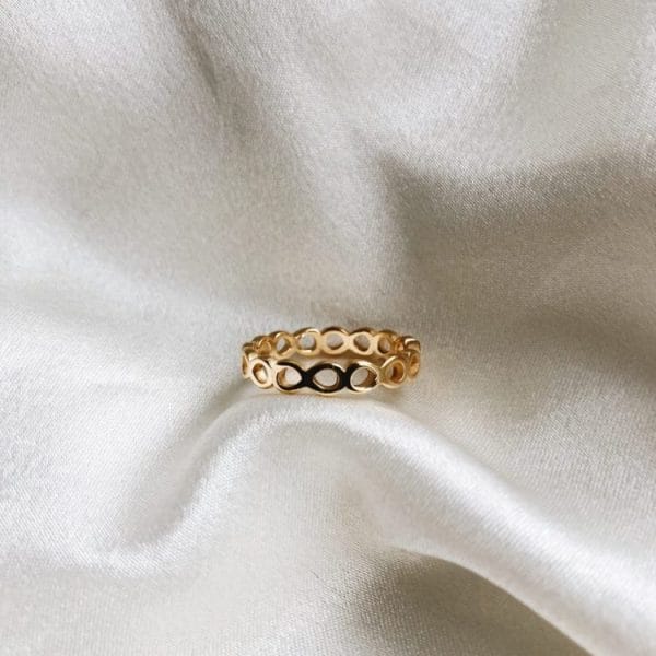 Anel em Aço Dourado Infinitos