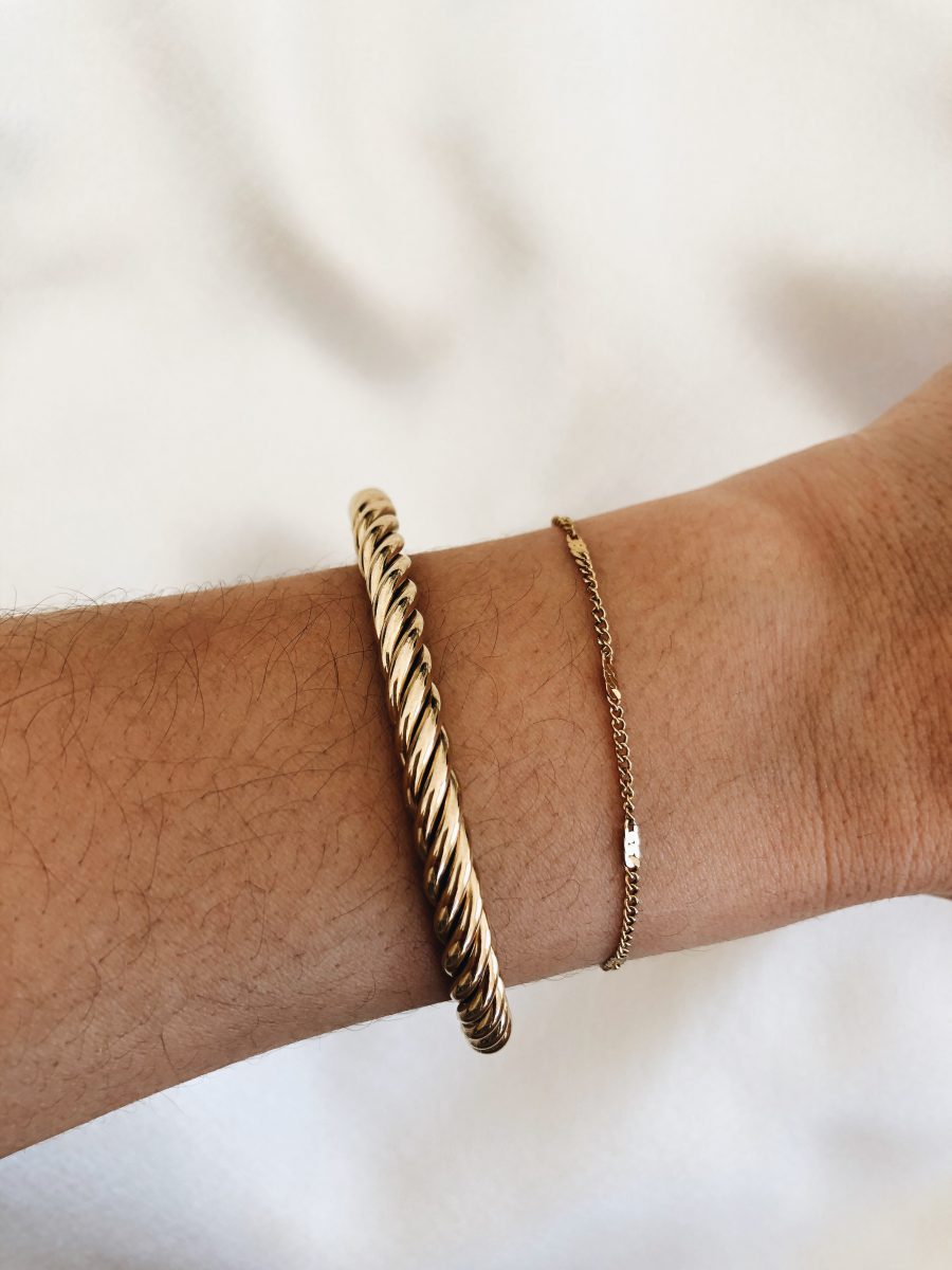 Pulseira em Aço Dourada Torcida