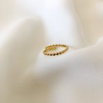Anel em Aço Dourado Ajustável com Bolinhas