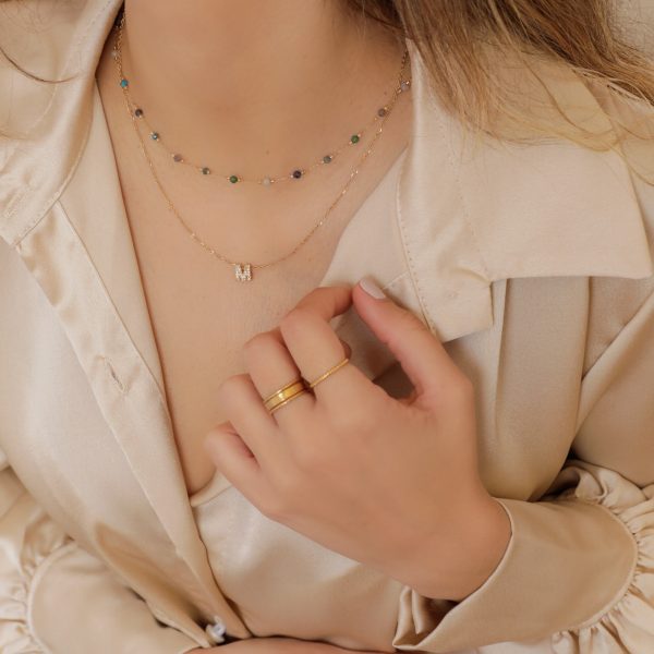 Colar em Aço Dourado com Letra de Zircónias
