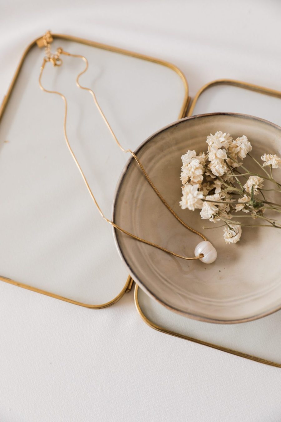 Colar em Aço Dourado com Pérola de Água Doce Grande