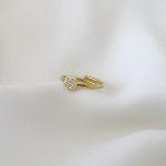 Anel em Aço Dourado Flor com Zircónias