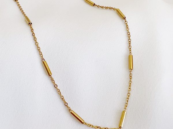Colar em Aço Dourado com Cilindros