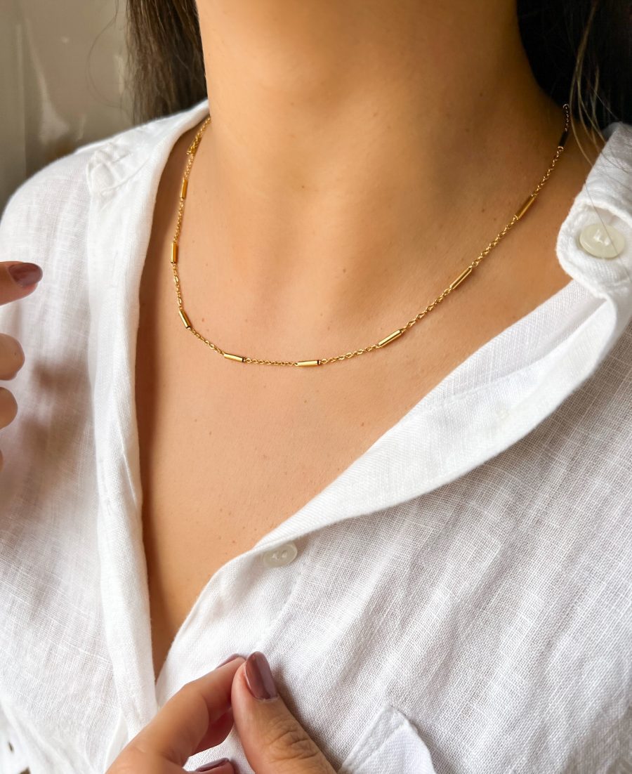 Colar em Aço Dourado com Cilindros