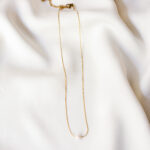 Colar em Aço Dourado com Pérola de Água Doce